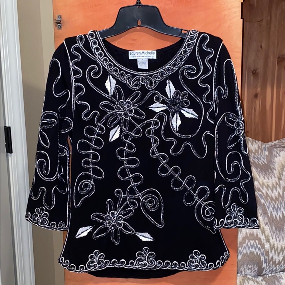 Black and white patterned blouse